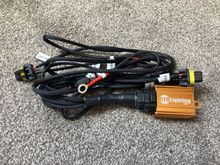 This is the H4 relay harness. When I placed my order at TRS,  I got a message saying this was on backorder. Then I got a message saying they could substitute with this one.