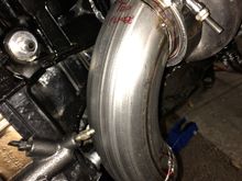 Looks like the bleeder screw is touching, but it isn't