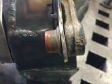 Forming the outer part for the carrier to bolt onto the trailing arm.