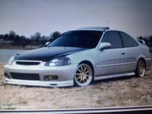 work in progress to look like this but w/out spoiler and CF HOOD al most ther need rims and sum coil over instead of springs and mite paint car again.. black!