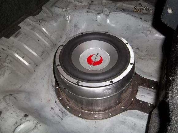 2000W dual voice coil sub in custom trunk setting.