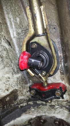 This is the bottom of the shifter linkage that is in the car, next to the brand new bushing well one of them, from the diagram the bushing is supposed to be inside the black metal housing.