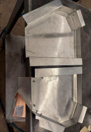 2 trays done.  The drivers side has an extension to push the water further forward and over towards the passenger side away from the dipstick area.