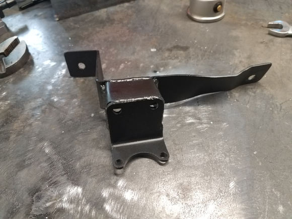 New fuel pressure regulator bracket.