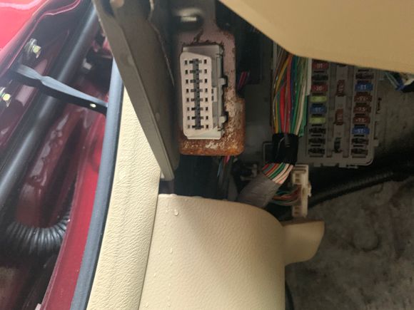 Fuse box under drivers side 