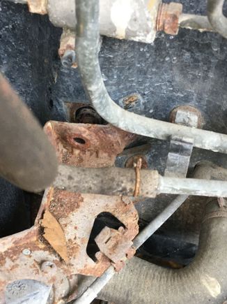 Bracket that holds the heater hose has a broken stud/bolt. I’ll probably zip tie it down, then see if a machine shop can remove the broken stud/bolt once the car is driving. 
The heat adjustment cable still works, but it gets stuck. I’ll just try to use it twice a year, before and after the winter.