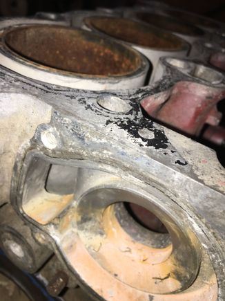See how close the water pump housing is to the hole where the head bolts thread into.