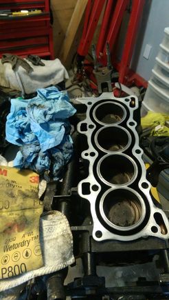 Wet sanding block to prep for new head gasket.