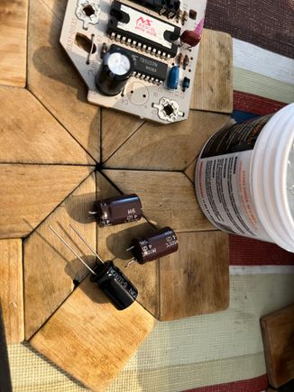 Old (brown) capacitors out, 1 new capacitor soldered in