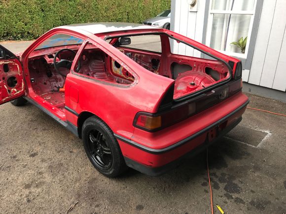 Tail lights and bumper on. Almost looks like a car now. 
