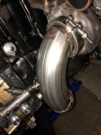 Looks like the bleeder screw is touching, but it isn't
