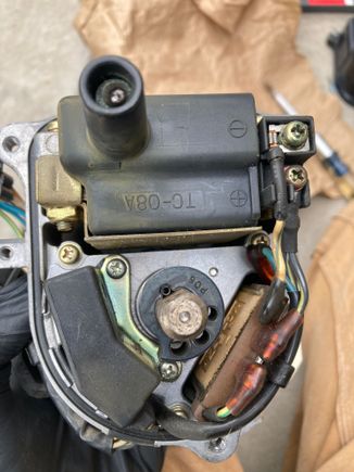 In this pic you can see the little spring pin holding the trigger