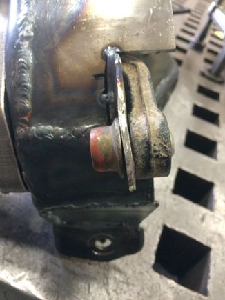 Forming the outer part for the carrier to bolt onto the trailing arm.