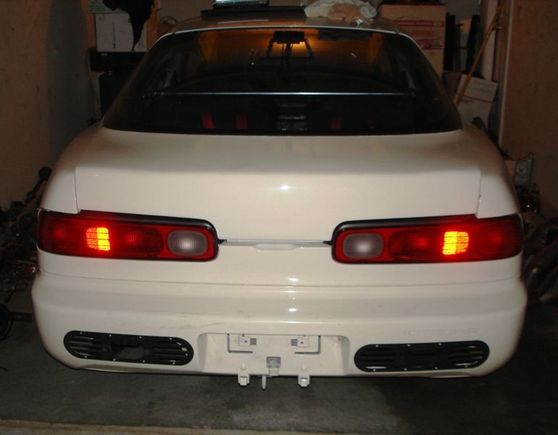 BACK END...YES THE TRUNK CLOSES...ITS JUST HELD OPEN BY A RUBBER MOUNT AT THE MOMENT
