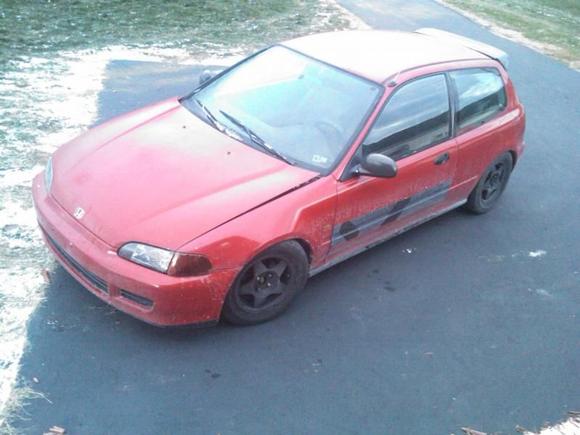 Very dirty from salty roads. The black stripe gives me a good reason to get it painted really soon.