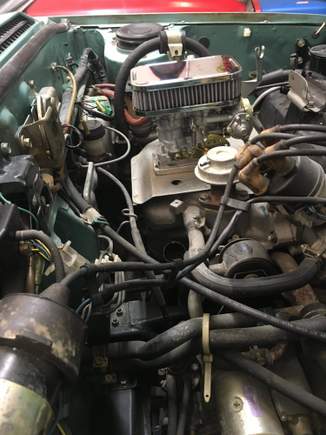 Placing the weber carburetor.