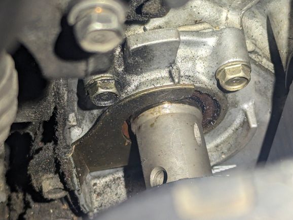 Balance shaft next to the dipstick. It looks like so much oil came out it leaked into the belt cover and into this? Or does it look like the seal needs to be replace? I don't see anything leaking from the bottom of the seal. 