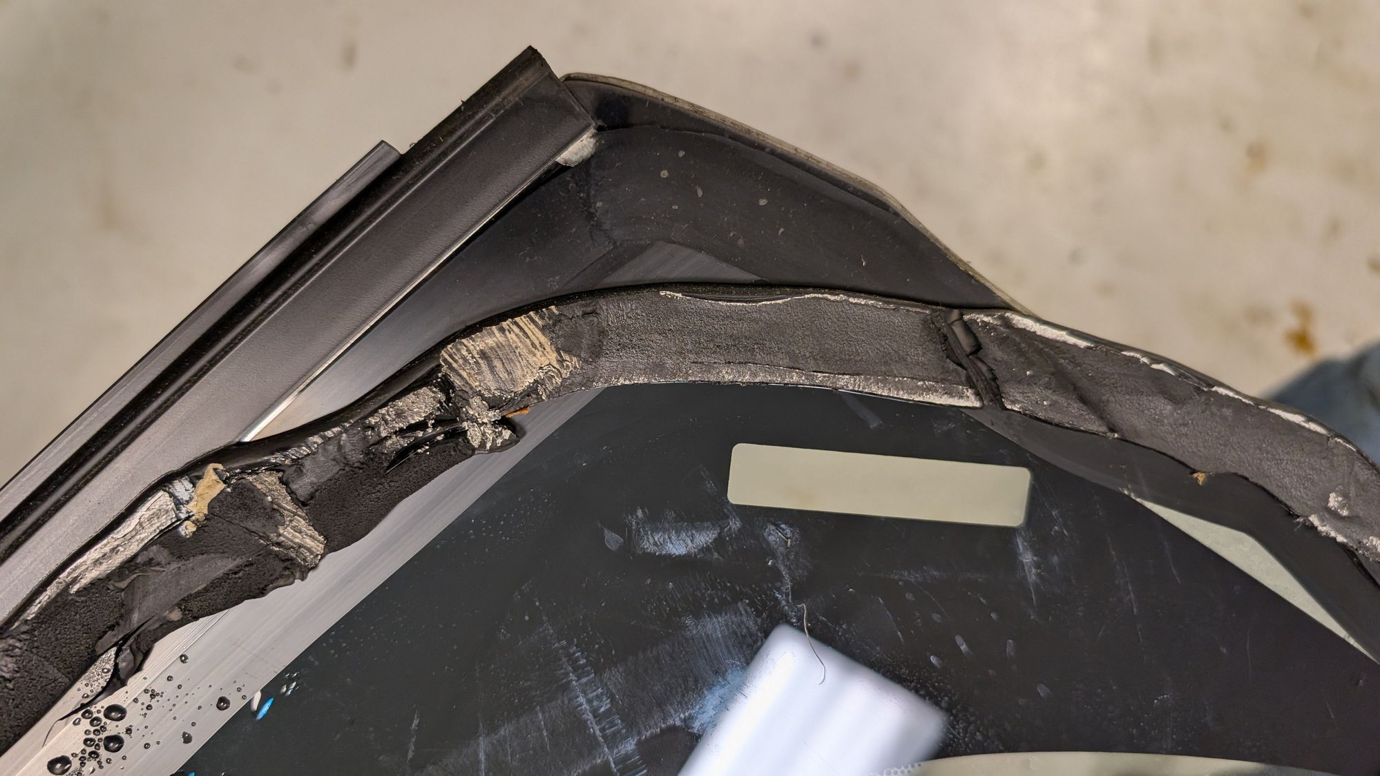 Up close on a rough section - this is what it looks like when it is cut away - the adhesive bonded to both sides.