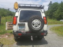 Brake pedal pressed and both brake lights illuminated as they should be. So vehicle harness and brake light switch are functional and the spare tail light wiring harness can be used.