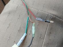 
Update from Fri.
Jury rigging that someone did with the cig lighter wiring.  At this point I was unsure if I would ever stop finding wires needing fixed.