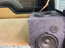 Detailed pic of speaker layout. Relocated rear door speakers with new subs in top (OEM from rear cargo door were shot). Yes, speaker cambers are ported and tuned for the subs. 