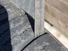 Last front mounted tire tread