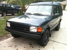 Wheels Blacked out, Bumper Stripped and Blacked out, still haven't painted the roof yet - but it's coming!
OH YEAH - Obligatory Power Steering Leak on the driveway!