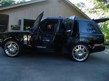 24&quot; Giovanni Rims.  Custom paint work done on door handles, tail lights, and Range rover Badges