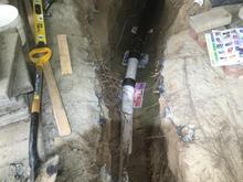 Last 6 feet of a 9 foot long trench, and of course it is under an elevated deck