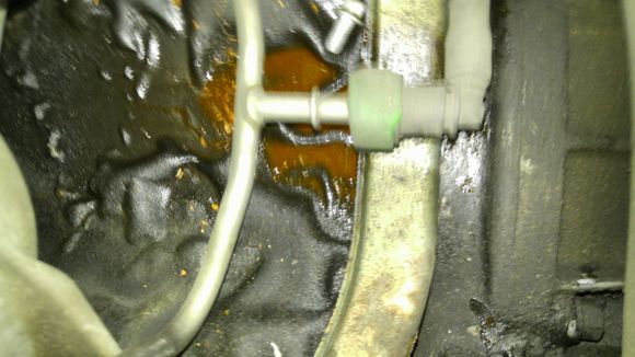 Coolant under ignition coils