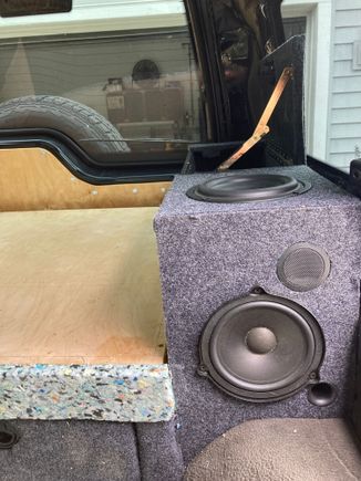 Detailed pic of speaker layout. Relocated rear door speakers with new subs in top (OEM from rear cargo door were shot). Yes, speaker cambers are ported and tuned for the subs. 