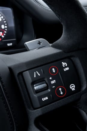 Steering wheel with Adaptive Cruise Control (with follow distance icons).