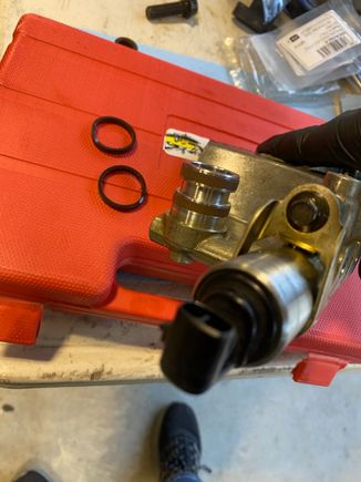 Replace the seals on the VCT solenoid housing and install.  These seals are Teflon split seals, not o-rings like the book says.