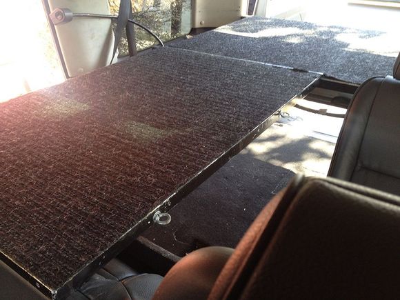 One of the rear seat can still be used. The deck is secured to the other end by the folded seat.