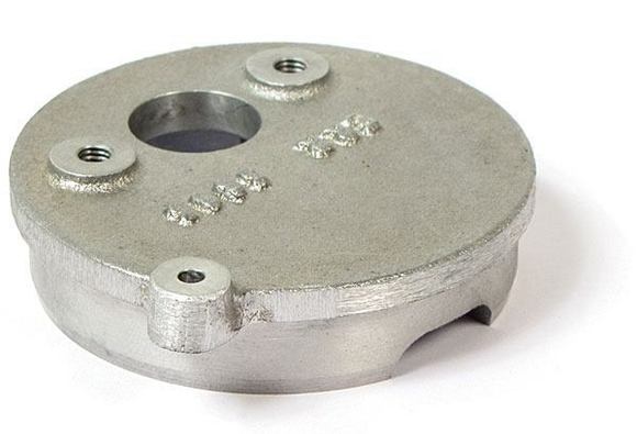 Backside of the crankshaft position sensor bracket.  Faces the reluctor ring.