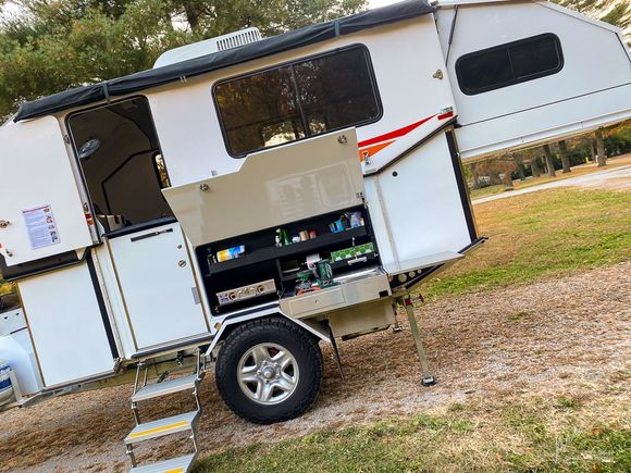 deployed state - manual or motorized vertical lift with manual queen size slide out bed. Propane outdoor galley with indoor galley with induction as a backup