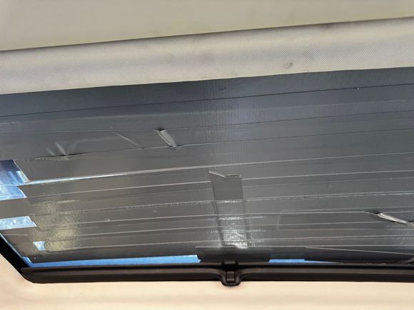 glass is cracked from hail.  have it tapped to keep it from further cracking.