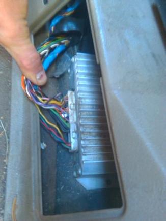 Amp under driver seat