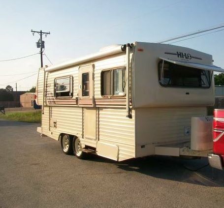 1991 Hi Lo 22R.  Bathroom subfloor is like a soggy diaper and being replaced, along with all floor covering, upholstery, and appliances/AC/Heat.  We will keep the tires.  haha