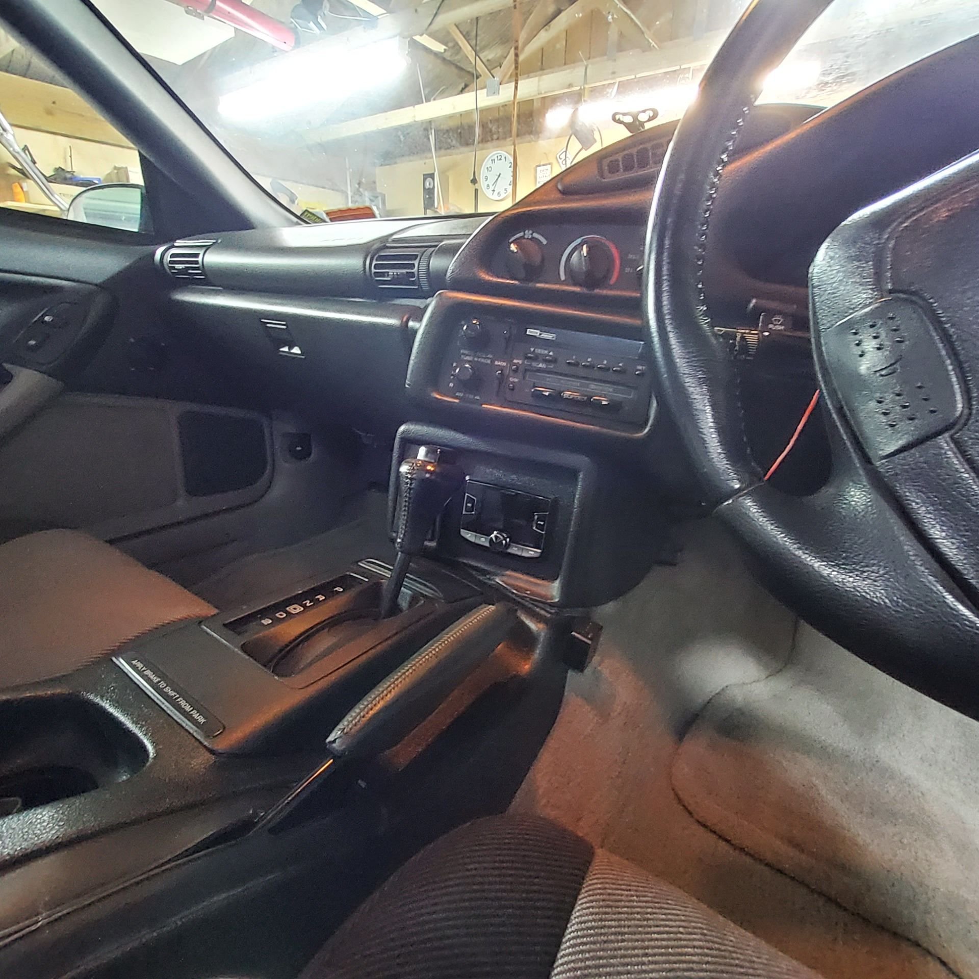 New Alpine display is not in your face, still have the BOSE tape deck.. and if I select AUX on the Alpine the BOSE will play though the Alpine... now thats cool
