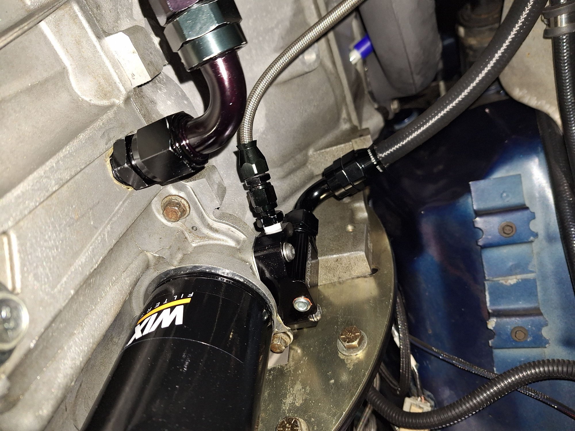 PTFE line going into accumulator adapter