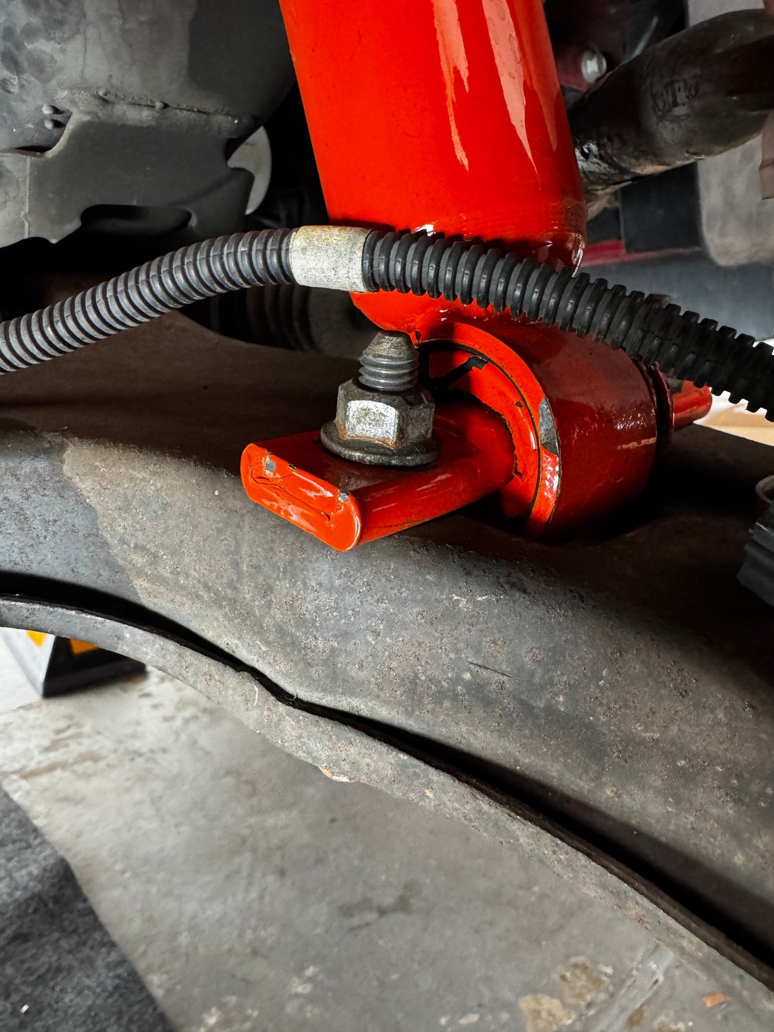 Front Passenger Side (rear of shock mount)