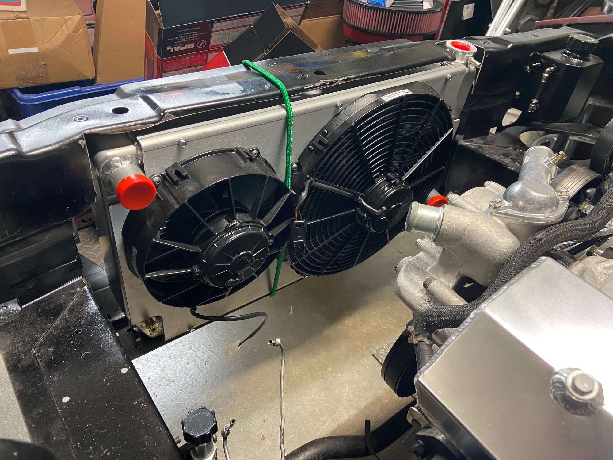 Mocking up my radiator with the mighty mouse fan shroud. Got a pair of Spal fans. The 9� in picture I ended up changing out as it was a 24v and not what I wanted.now have a lower profile like the other fan. Been seeing people having issue with cooling and thought the sclerosis would help pull/direct air. 