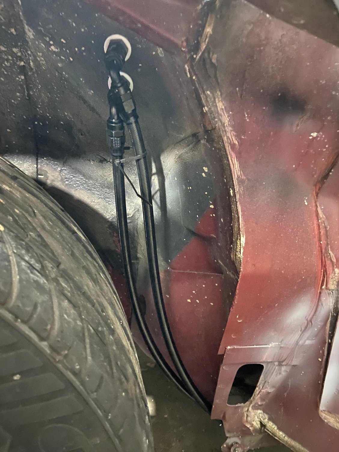 Loosely mocked the fuel lines that have been tucked up closer and secured to the rear of the fender well. These will be hidden and protected behind the inner fender well.