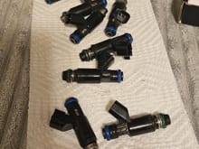 $50 flex fuel gm 36lb injectors, could use new o rings but injectors flow fine. Just went to turbo so had to go bigger. 