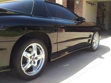 Sort of see my Baer drilled/slotted rotors with black calipers. 5%tint. Side molding and lettering delete.