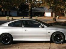 First Photo I took of the car with the Evo Lightning's on her (18x8 10/20 spoke rims gloss black center with a chrome lip). This was probably Mid November as I purchased the car on Halloween 2005. 
Side note: I Gotta stop looking at cars when I go to get a oil change at the dealer ship. I ended up trading in my 2002 WS6 on that day... Lube and a trade in???