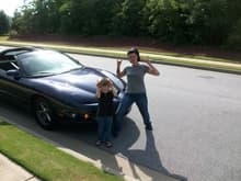 Me and my son rejoicing right after the car turned 100k miles