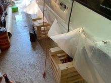 You can see how I wrapped the plastic sheeting up the side of the car and held the plastic there with super strong, rare earth magnets.