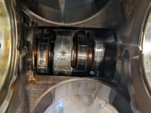Cam bearing welded to camshaft